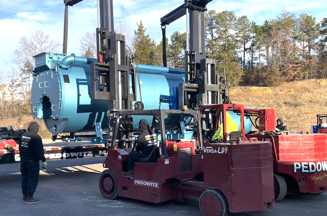 Pedowitz Machinery Movers Setting Plastic Extrusion Mixer and Chiller Rigging Fencing Company Salisbury NC 3