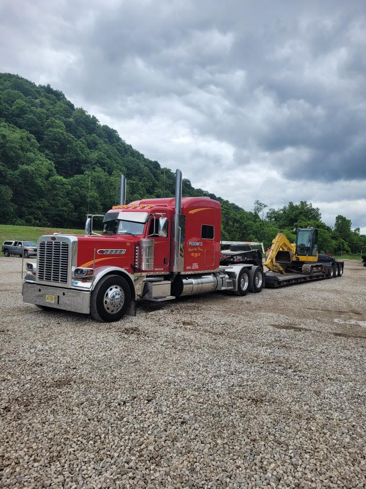 Pedowitz Machinery Movers trucking company transporting construction and demolition equipment Charlotte, Savannah, Charleston Knoxville (803) 679-1500 a